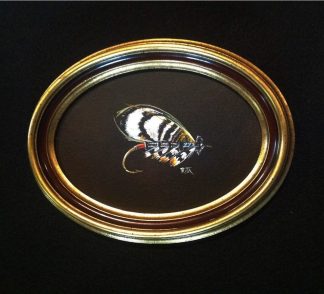 Hand painted classic salmon fly called the Evening Star. Hand painted by Rita Schimpff for Heritage Game Mounts.