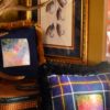 salmon flies and hand painted fish skins surrounded by 100% wool tartan